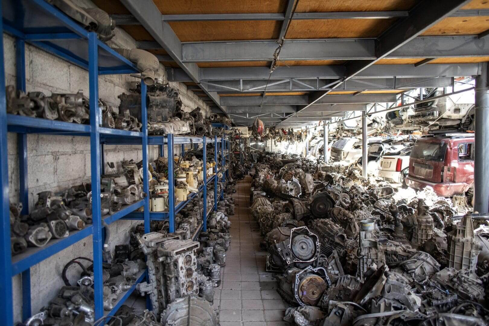 Rows of car parts in a warehouse.